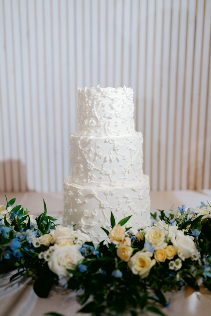 White three-tier wedding cake
