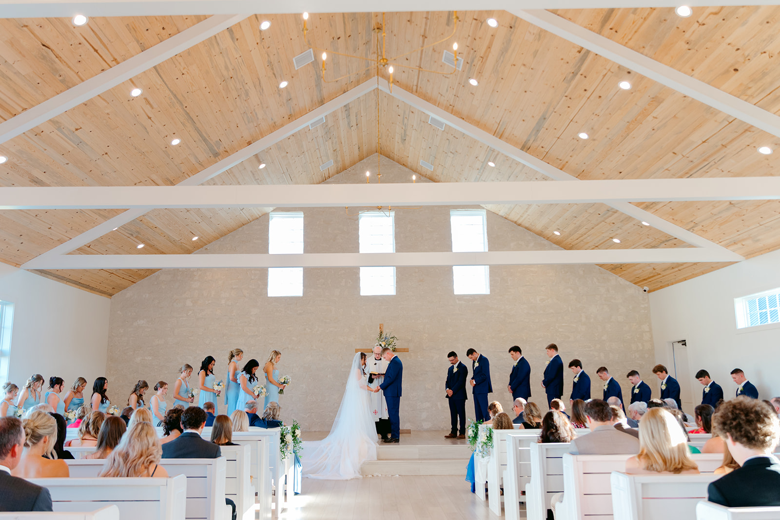 Bride and groom say vows at Camp Hosea wedding ceremony
