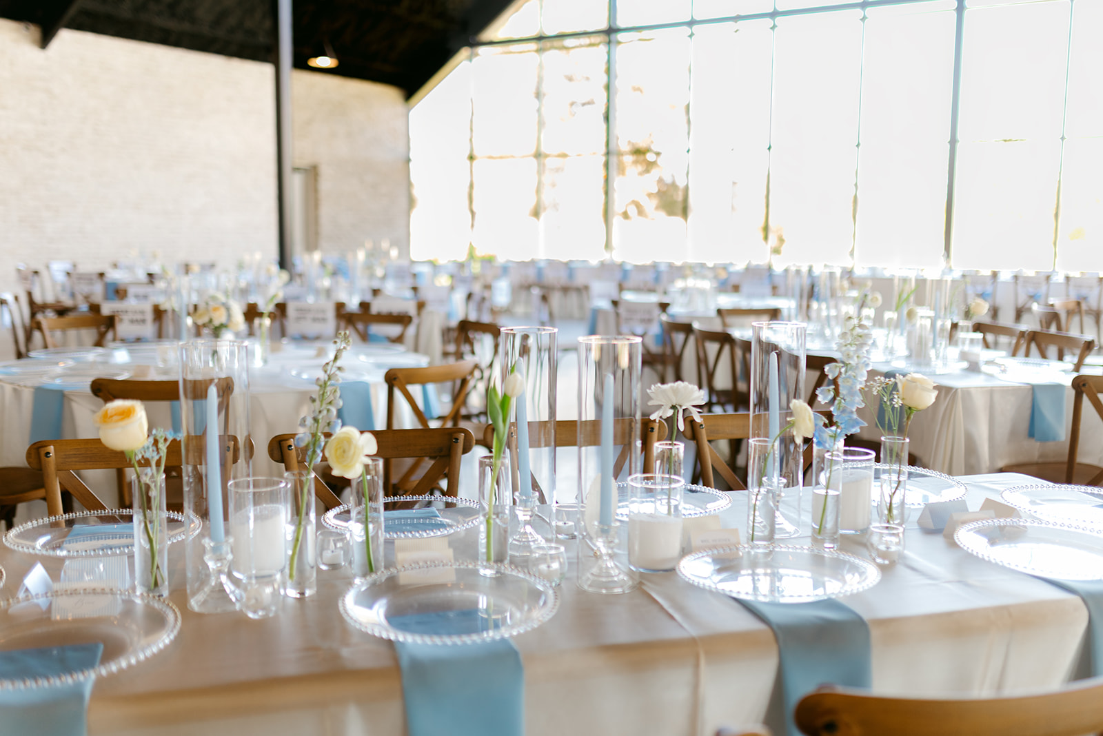 Blue and yellow wedding reception decor for the Camp Hosea wedding