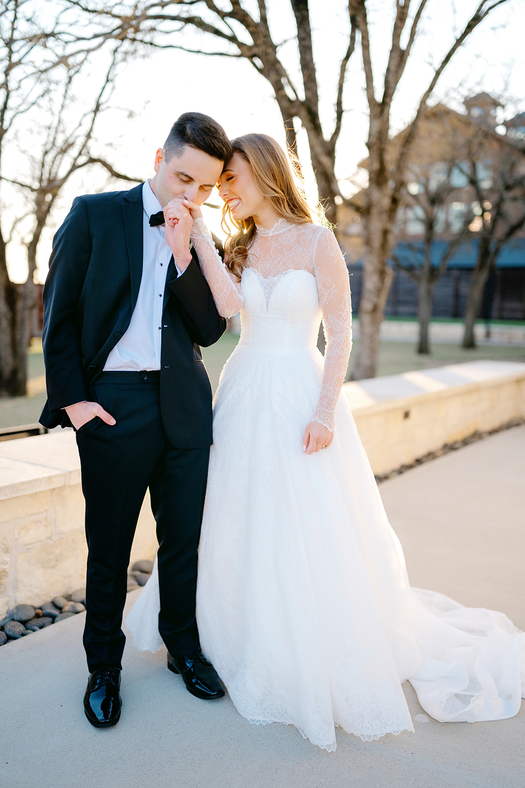 Bride and groom pose for couples portraits at The Weinberg