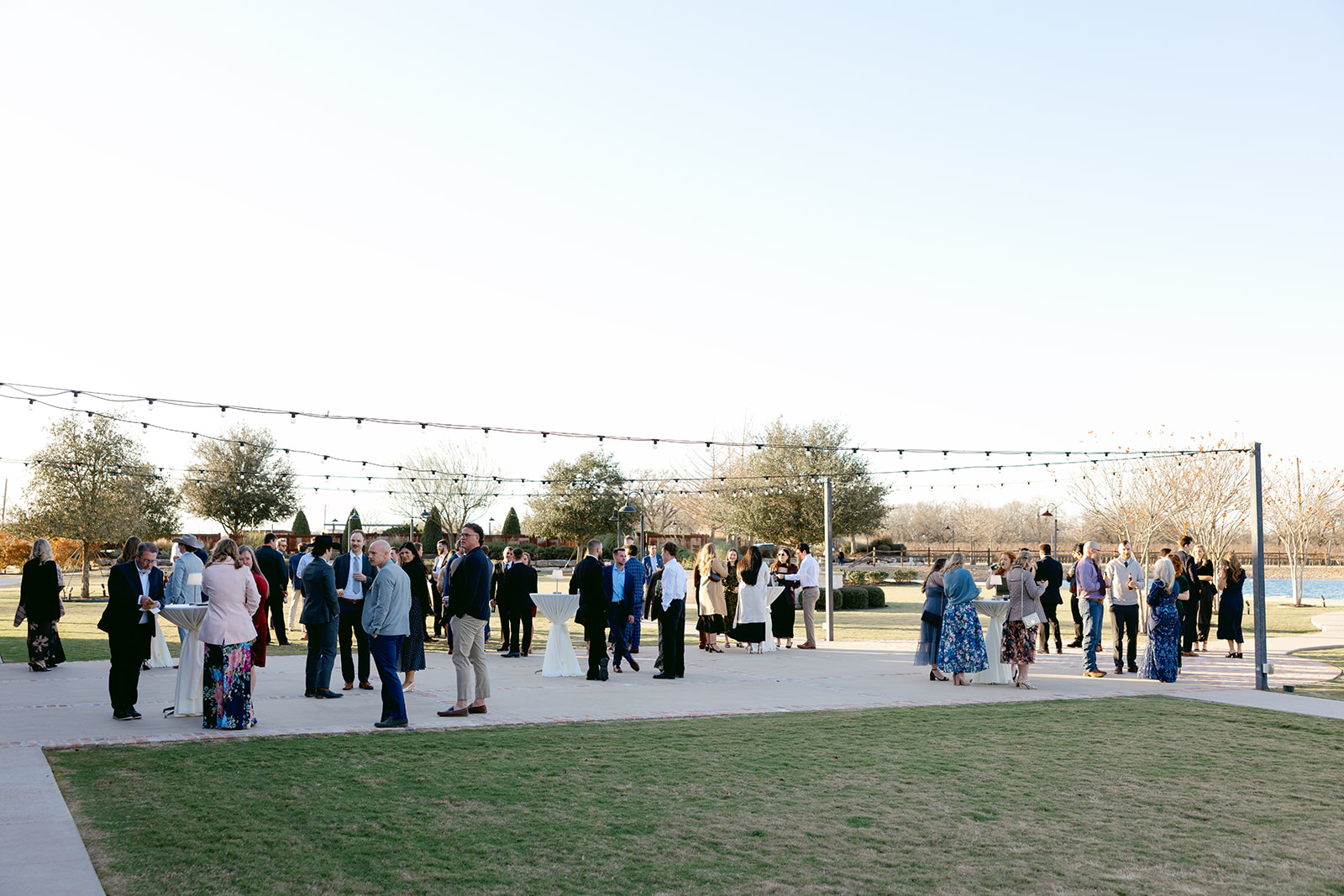 Guests enjoy cocktail hour at the Weinberg wedding