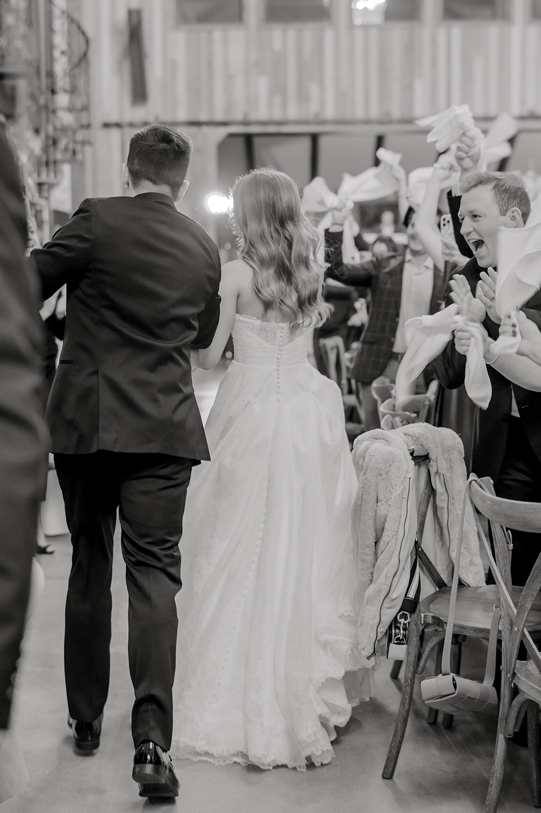 Bride and groom make grand entrance to The Weinberg wedding
