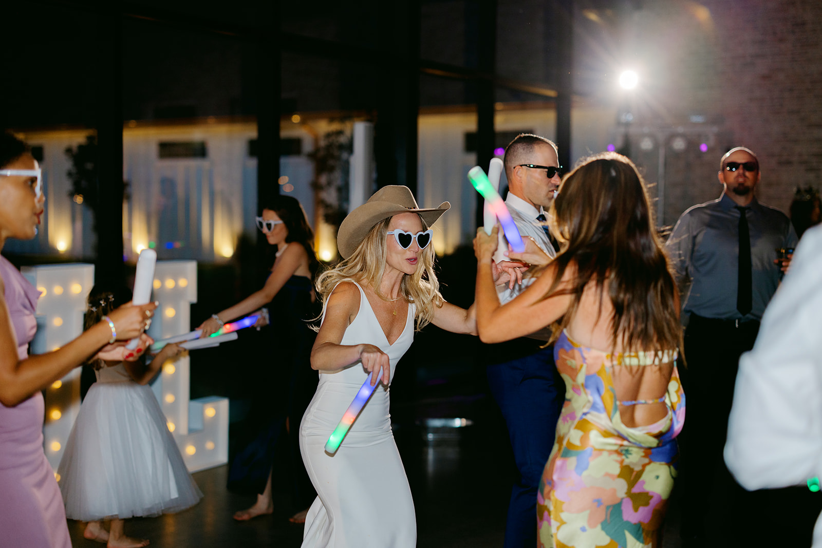 Guests enjoy wedding reception at Camp Hosea