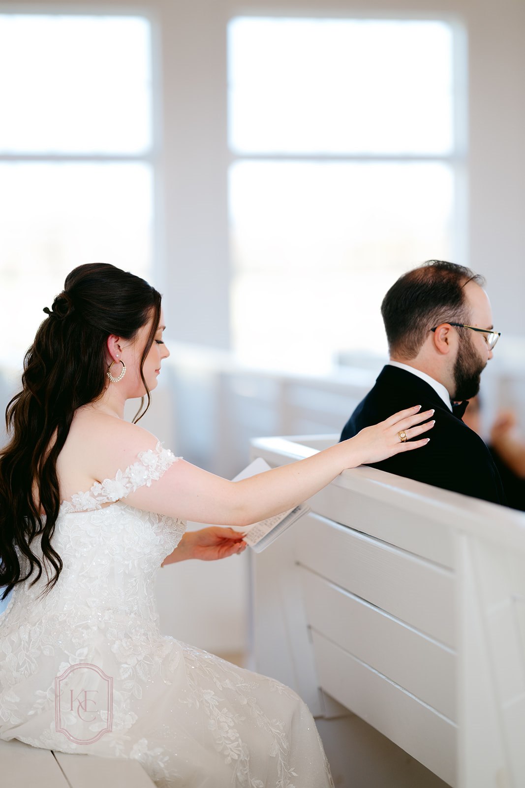Bride and groom say private vows inside ceremony space