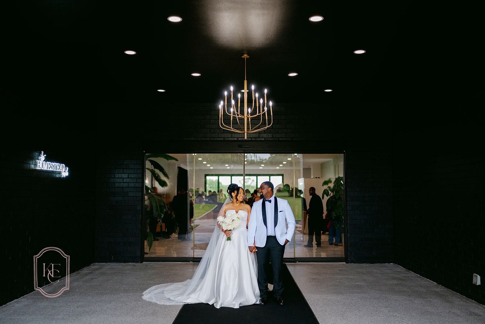 Bride and groom outside of their wedding at The Homestead