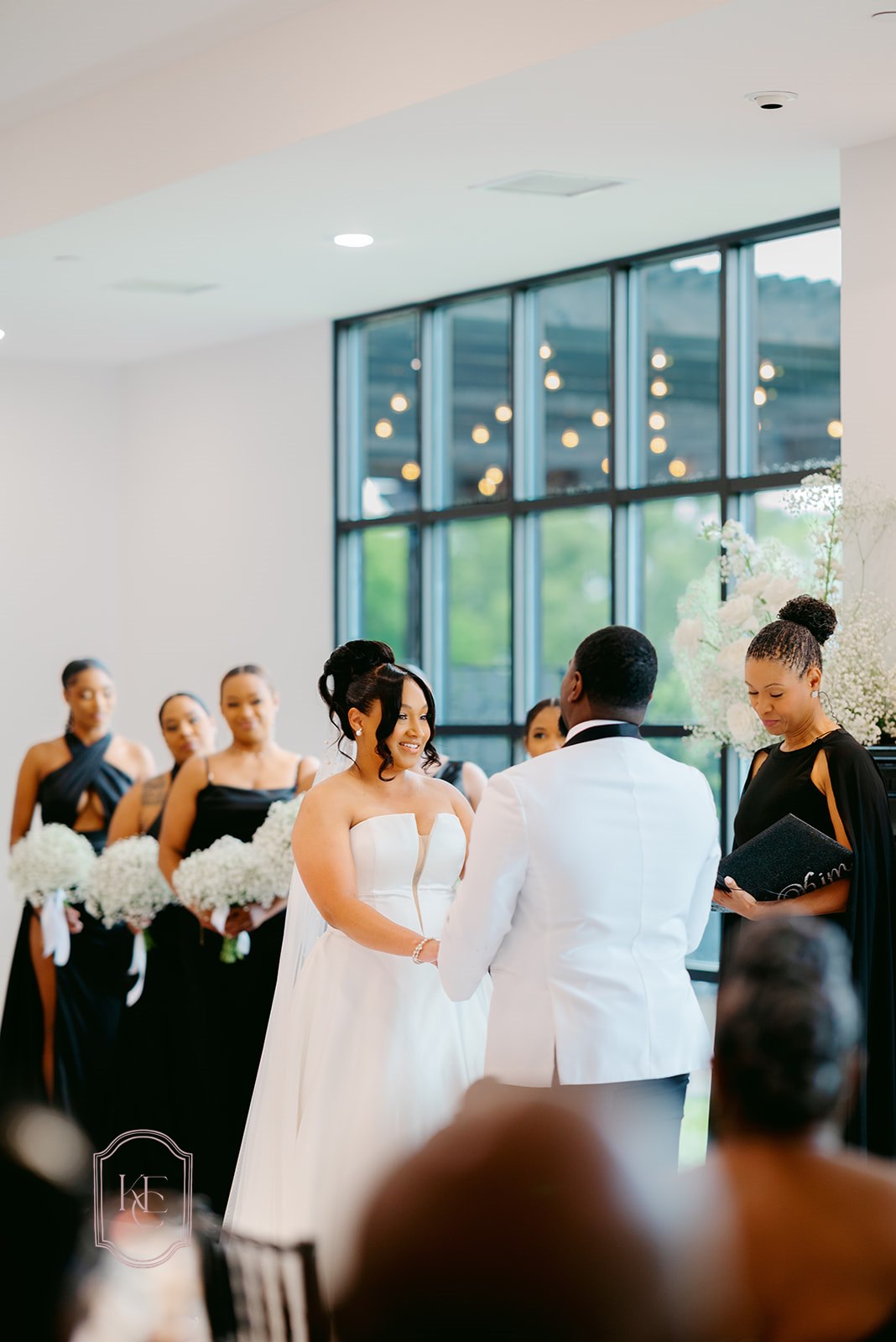 Bride and groom say vows at their wedding at The Homestead