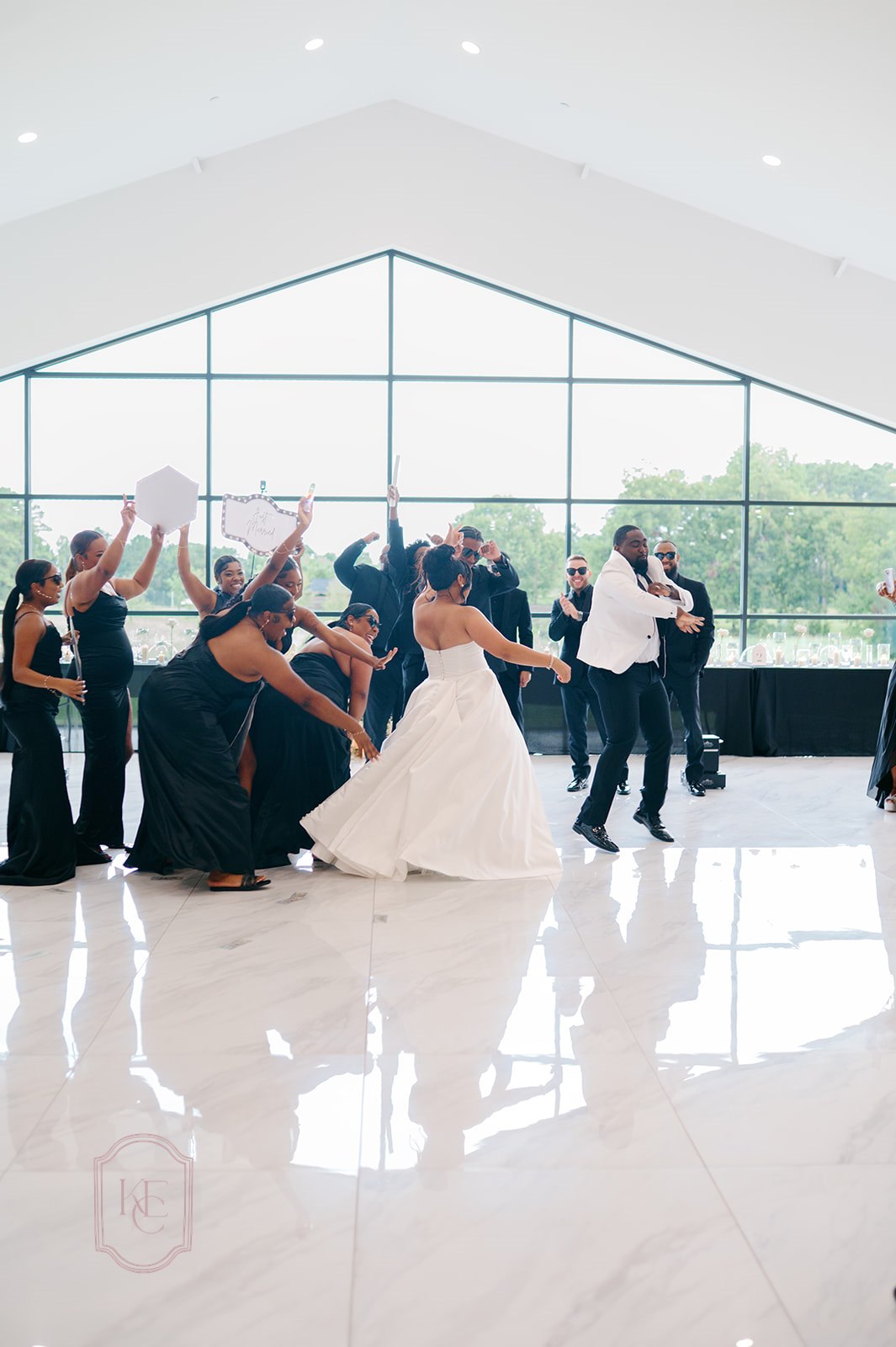 Bride and groom have their grand entrance to their wedding at The Homestead