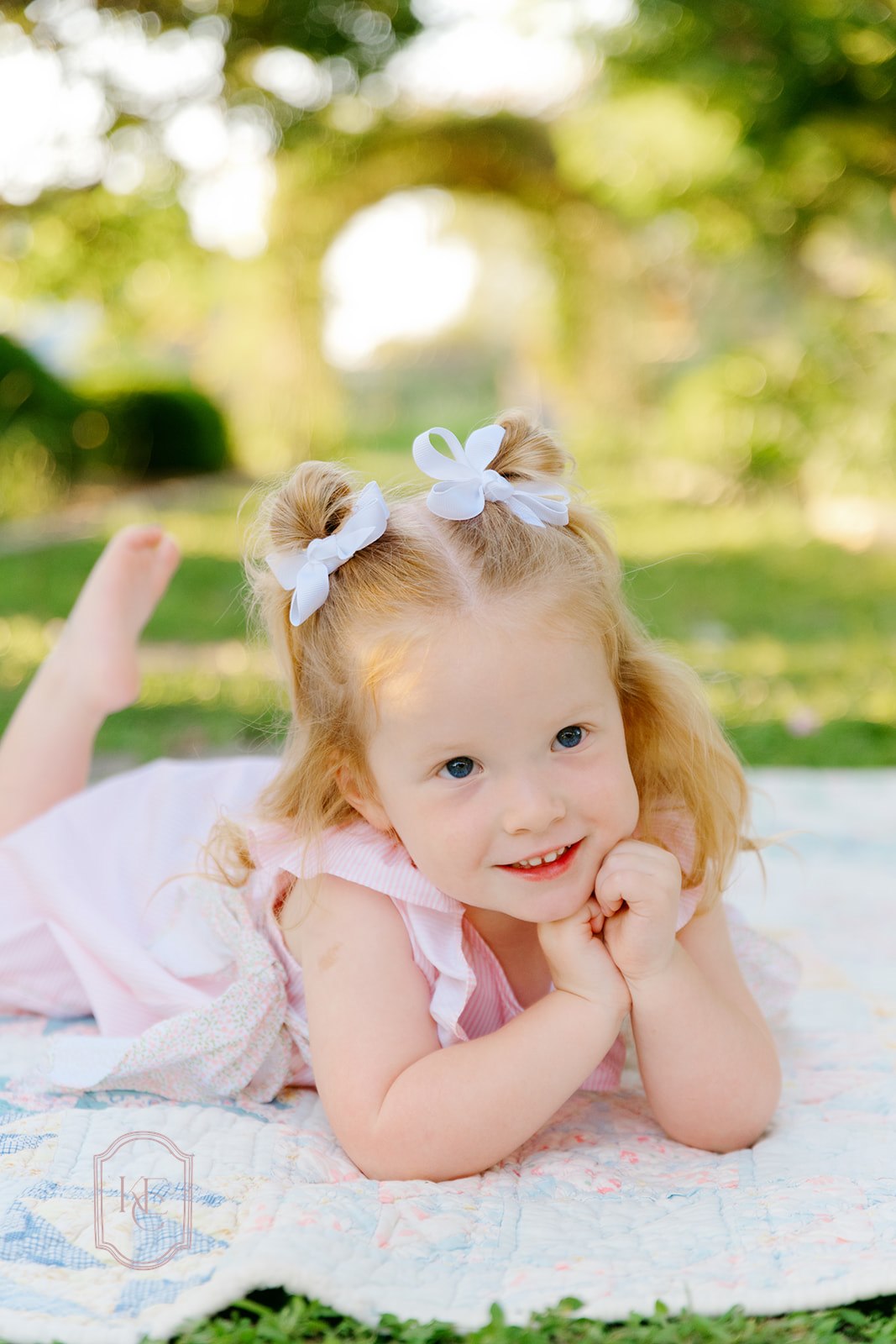 Toddler smiles at The Antique Rose Emporium