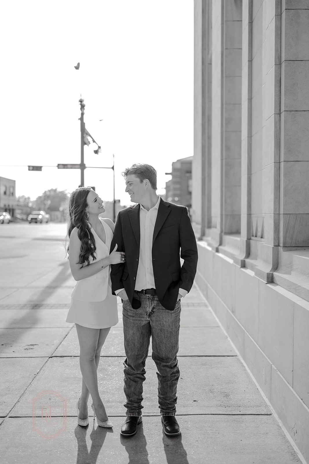 Black and white photo of couple at their outdoor engagement photoshoot