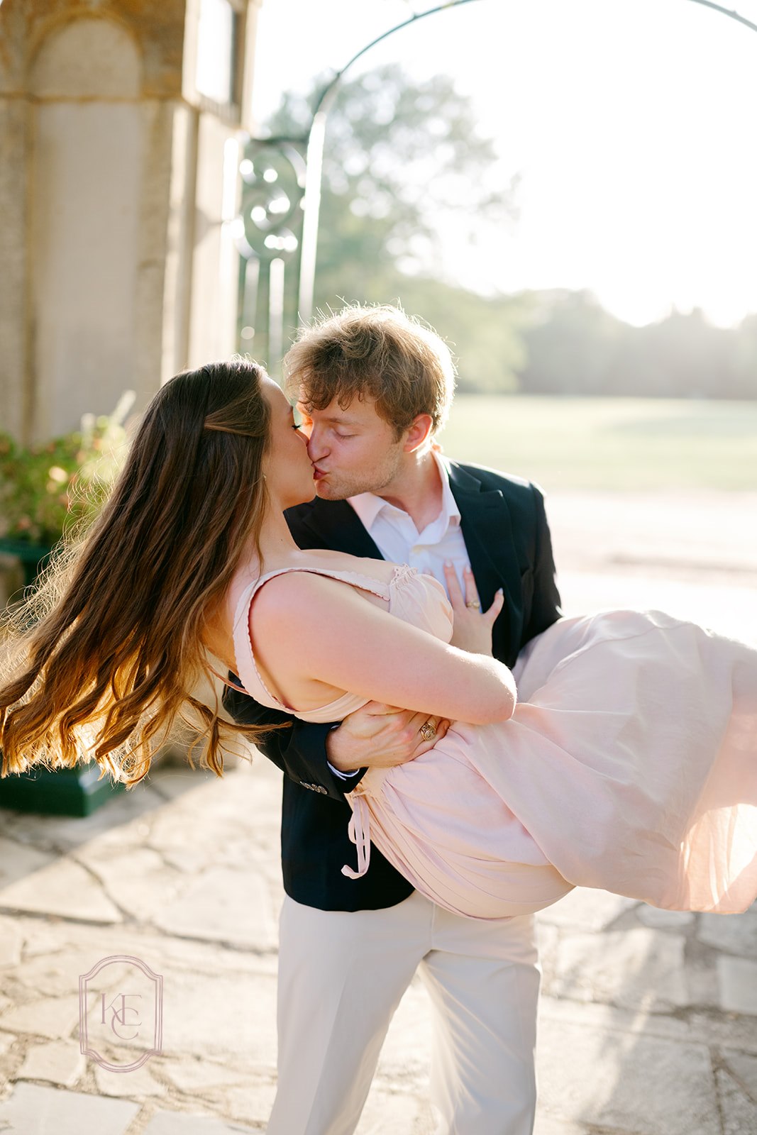 Man carrying woman at their Festival Hill Institute photoshoot