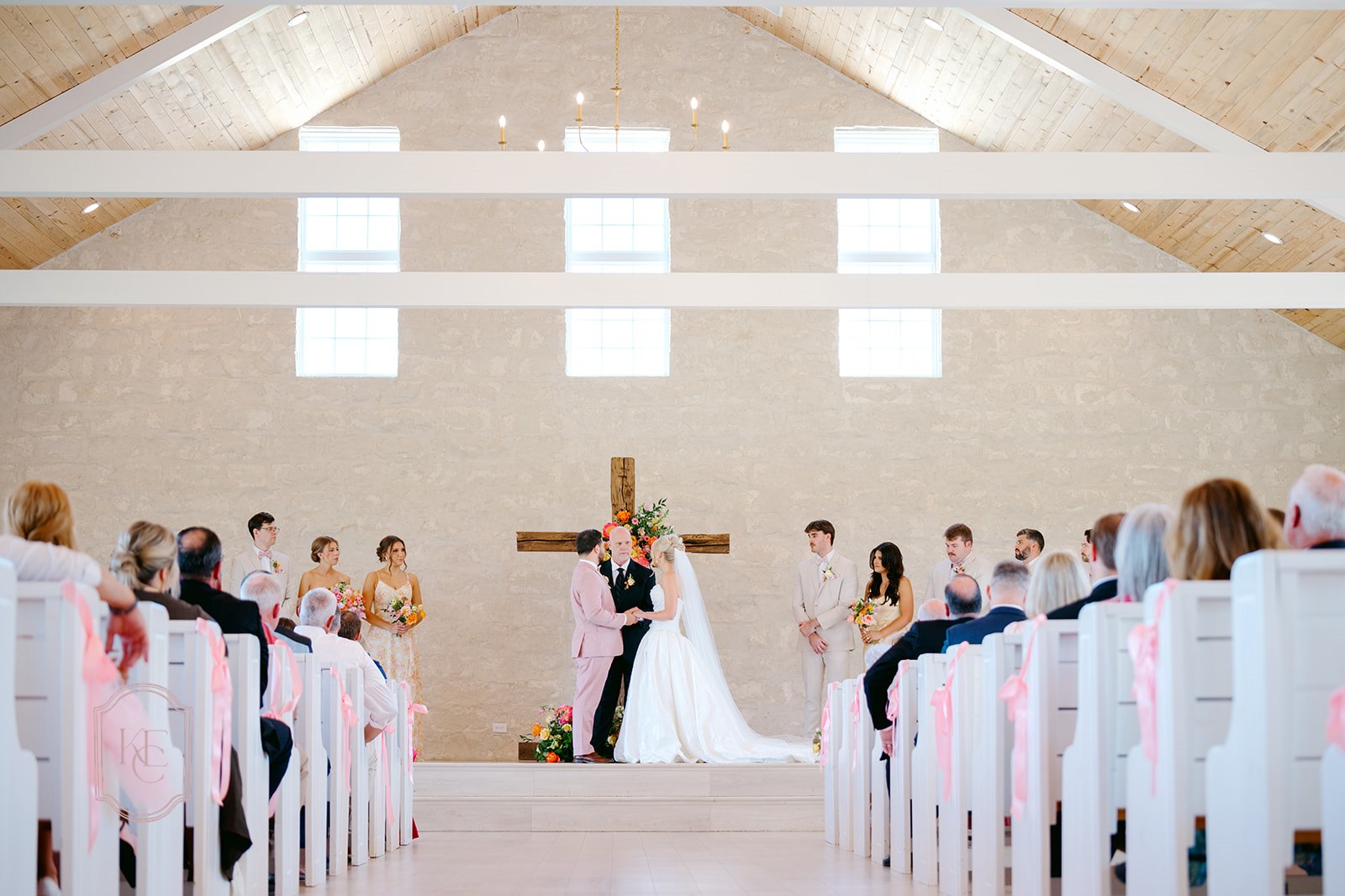 Couple says vows at their bright wedding at Camp Hosea