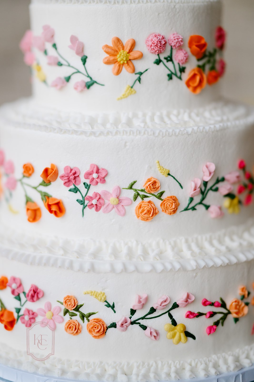 Bright wedding cake at the Camp Hosea celebration