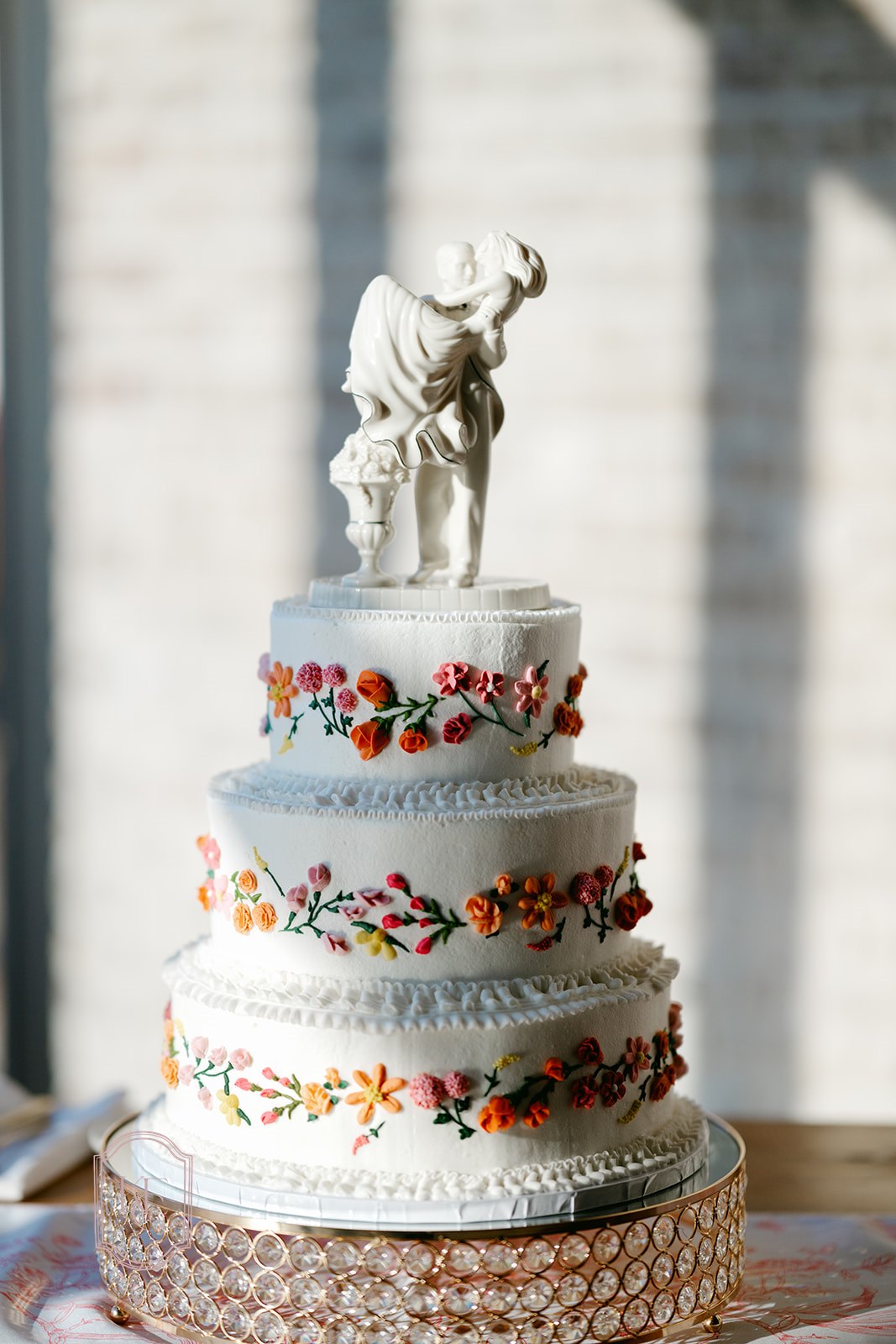 Bright wedding cake at the Camp Hosea wedding