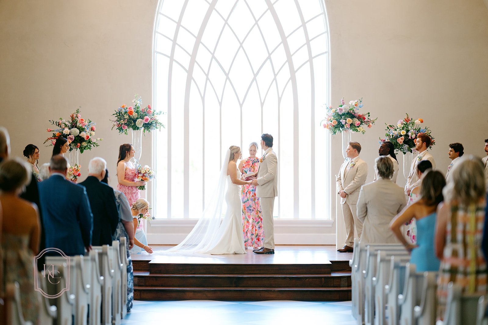 Bride and groom say their vows at their colorful wedding ceremony