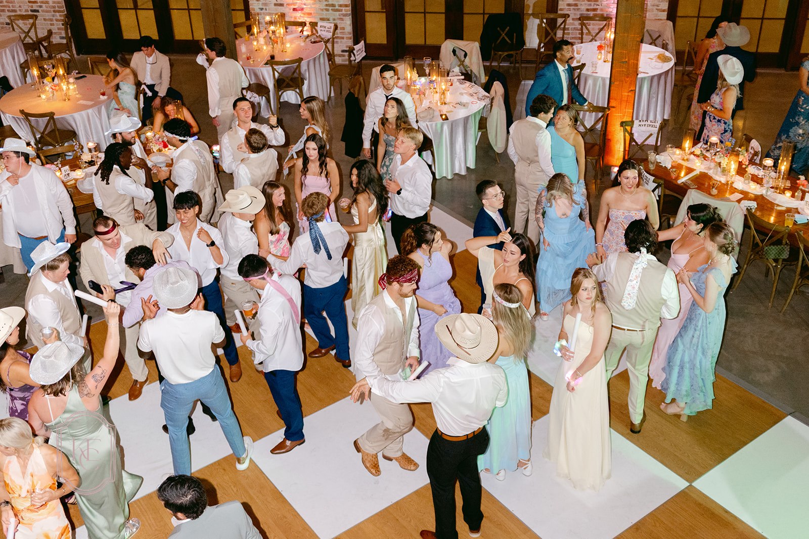 Guests at colorful wedding reception