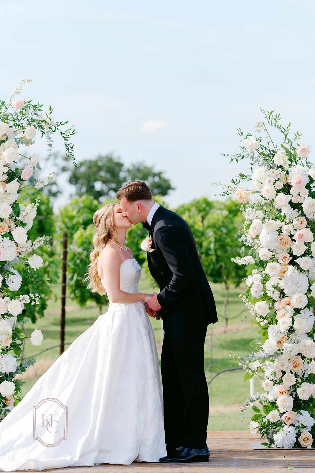 Bride and groom kiss at their Texas wedding